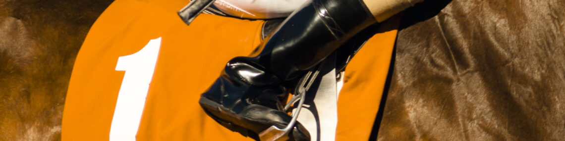 Jockey,Rides,Horse,Along,Track,Preparing,For,Race,Number,One