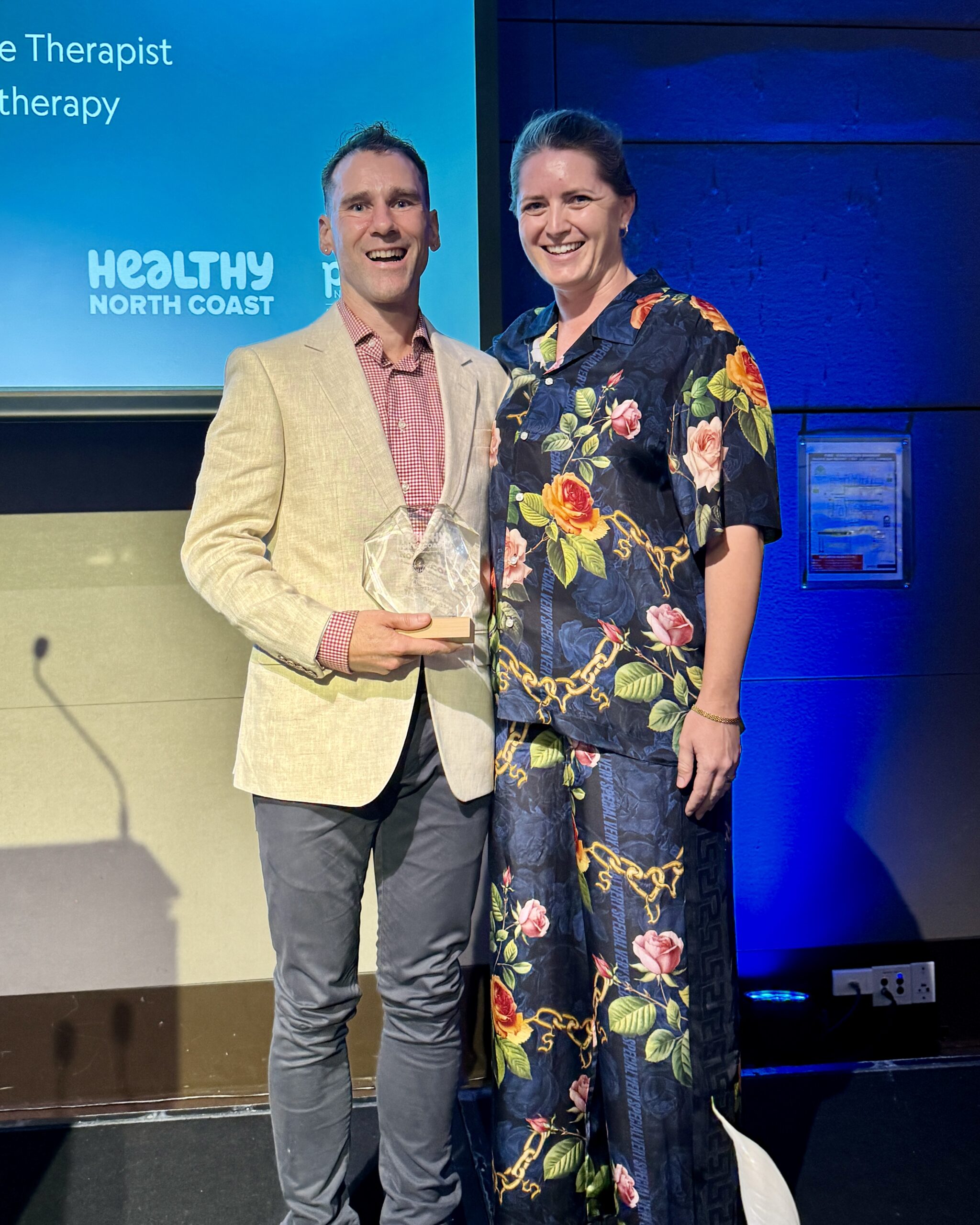 Trent Renshaw – 2025 Excellence in Allied Health Award Trent Renshaw receiving the 2025 Healthy North Coast Excellence in Allied Health Award.